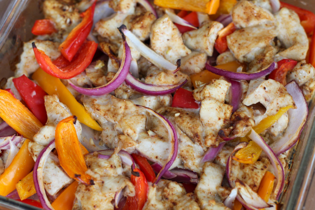 Close up dish of baked chicken fajitas