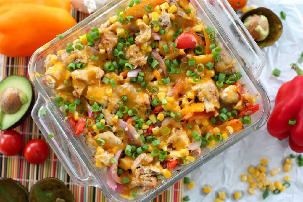 Healthy Chicken Fajita Casserole surrounded by veggies