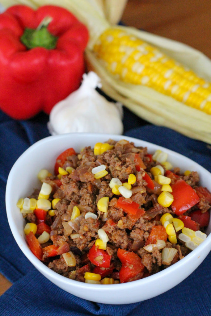 Taco meat with corn and red bell pepper