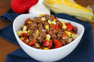 Taco meat with corn and red bell pepper
