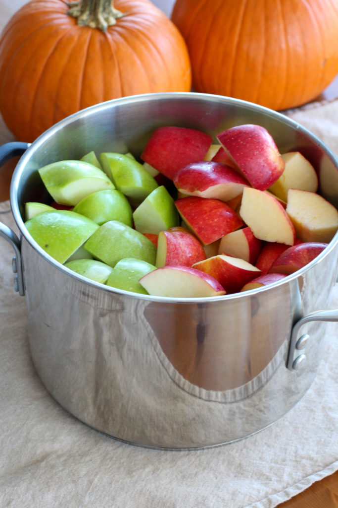 Pot full of granny smith and gala apples