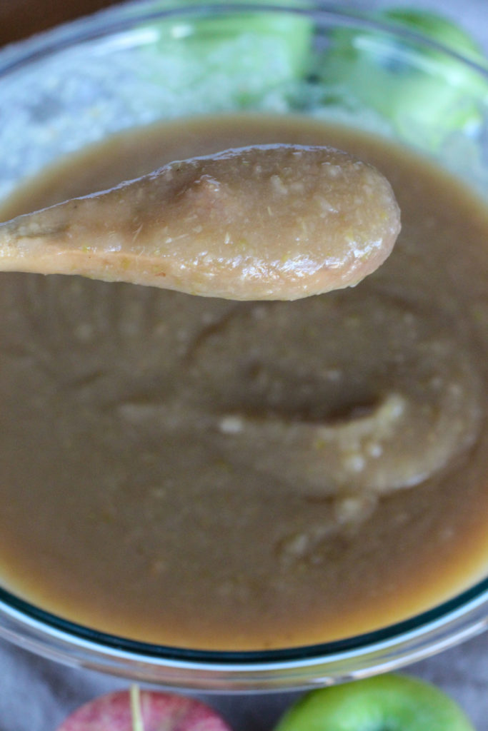 wooden spoon with homemade applesauce
