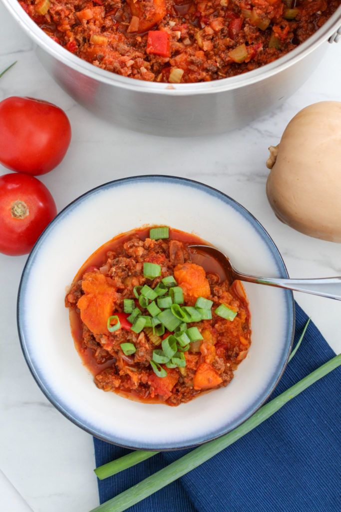 Pot and bowl of butternut squash chili