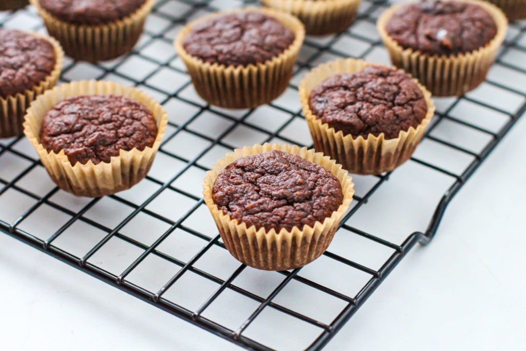 Cooling rack of healthy chocolate banana muffins