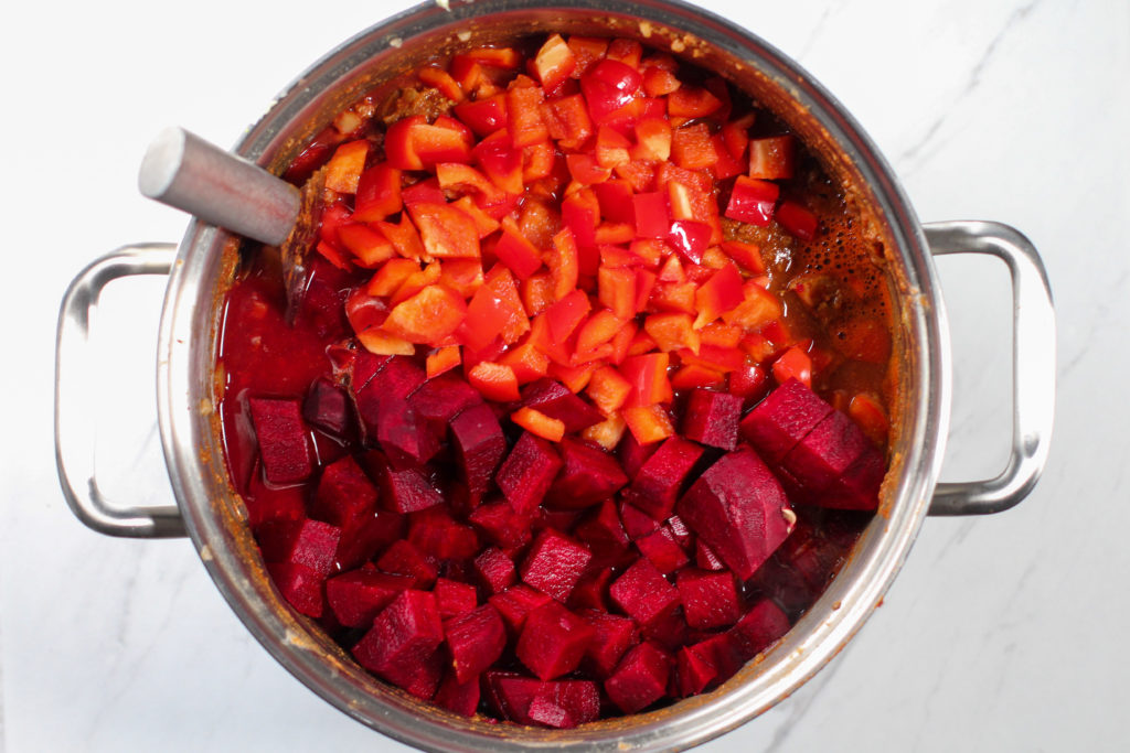 pan with beets and bell pepper on top