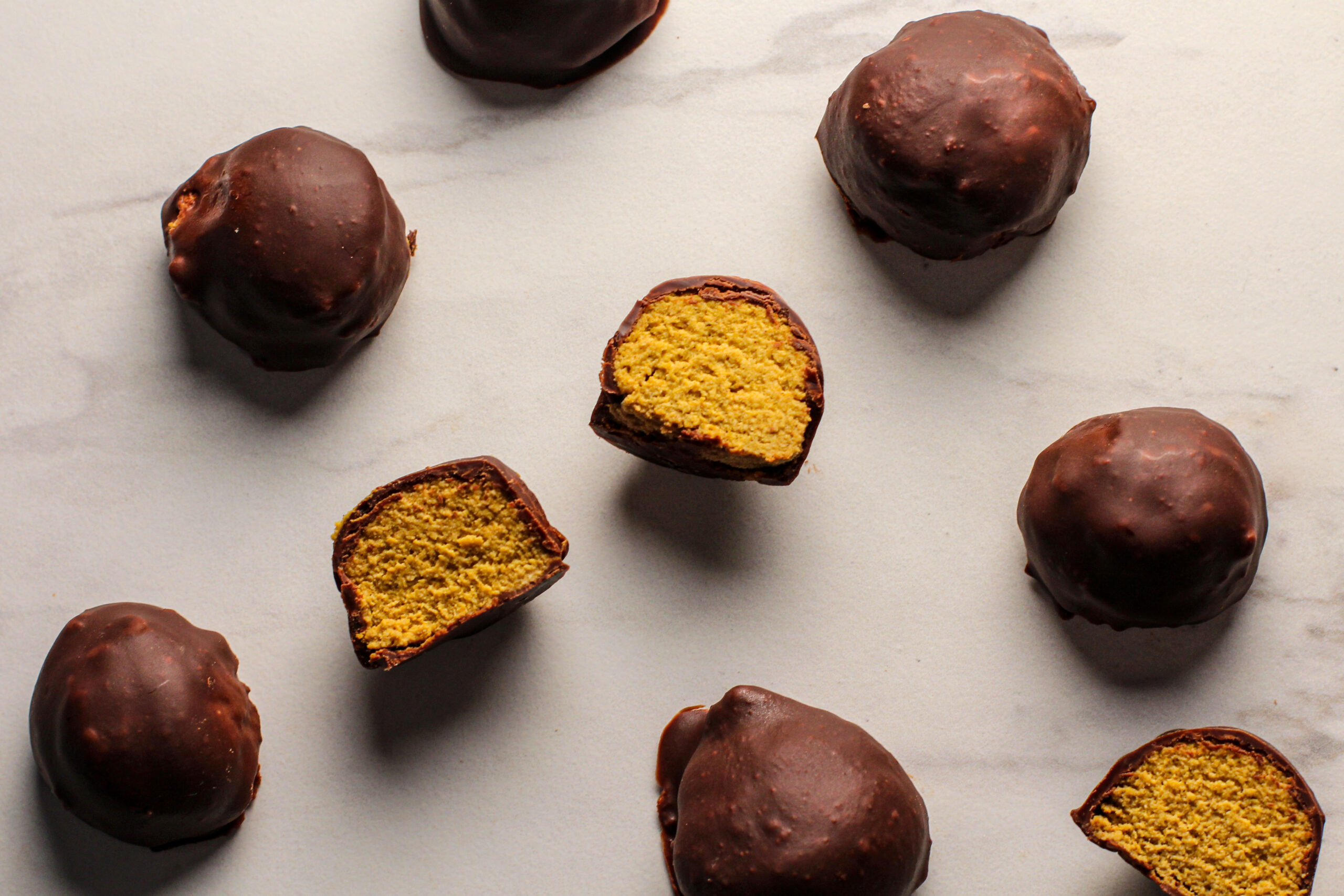 pumpkin pie truffles cut in half