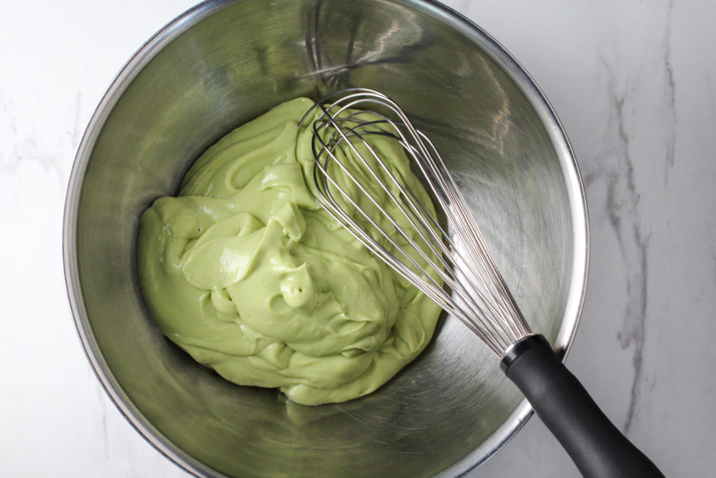 silver bowl filled with avocado puree