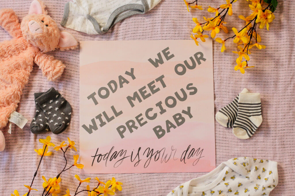 scrapbook page that says Today we will meet our precious baby for natural birth encouragement