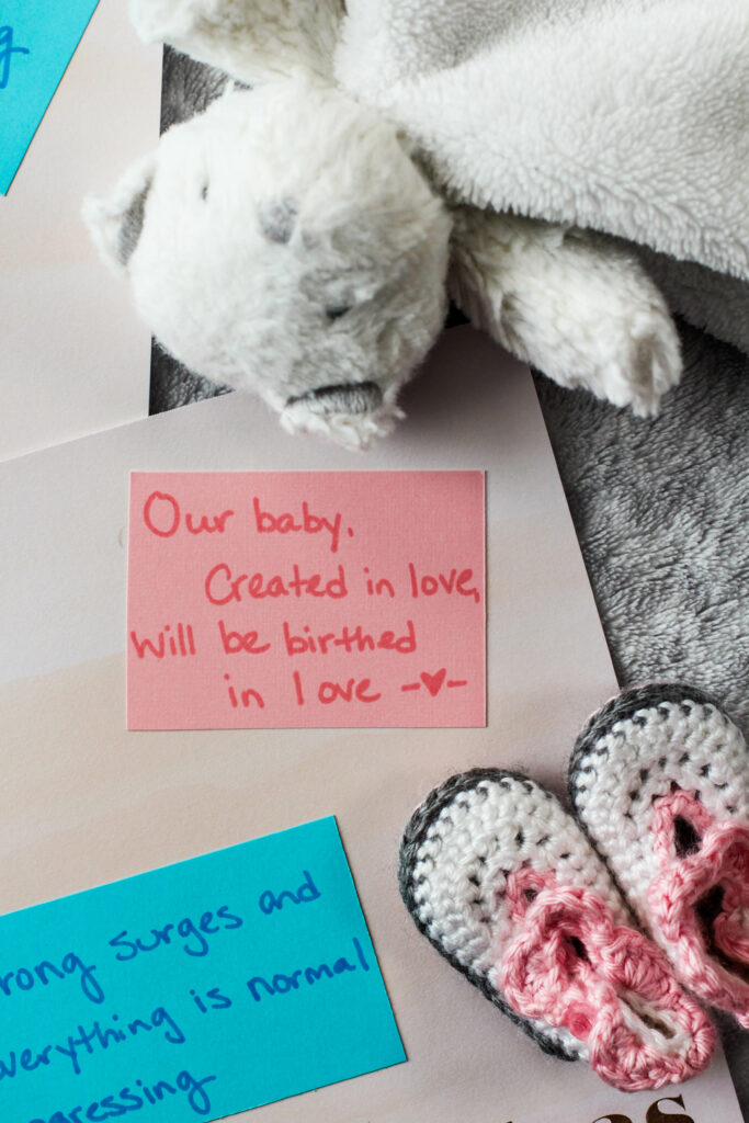 birth scrapbook photo with baby shoes and polar bear