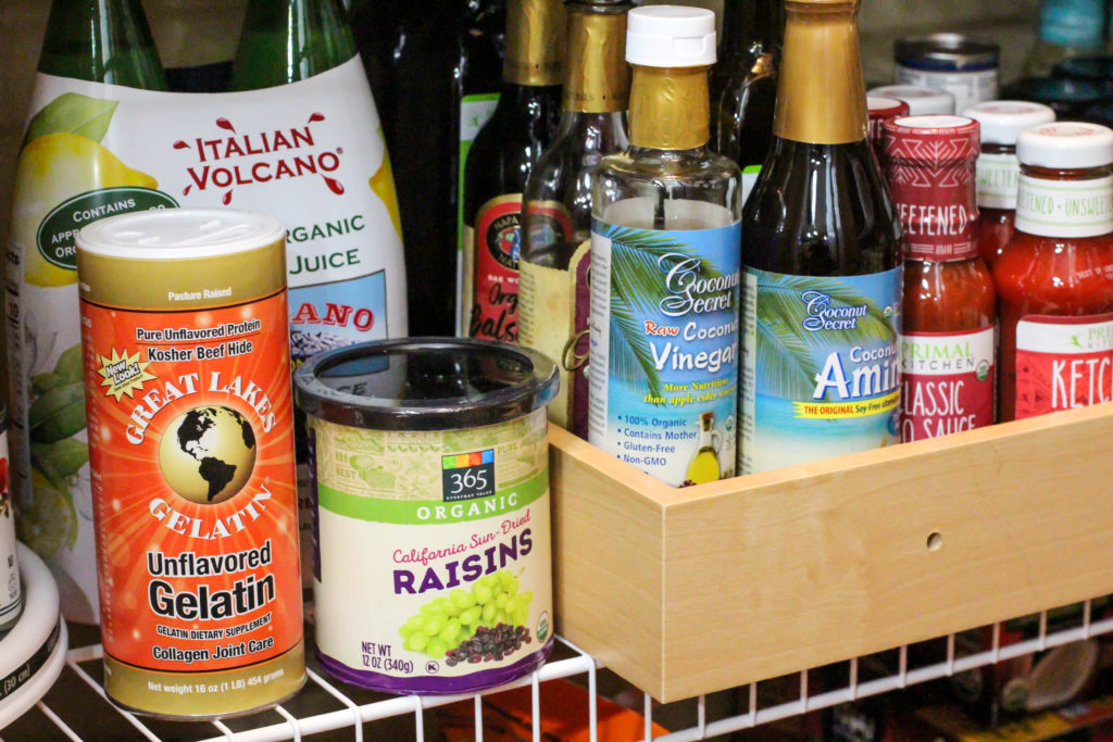 pantry shelf full of healthy shelf stable condiments