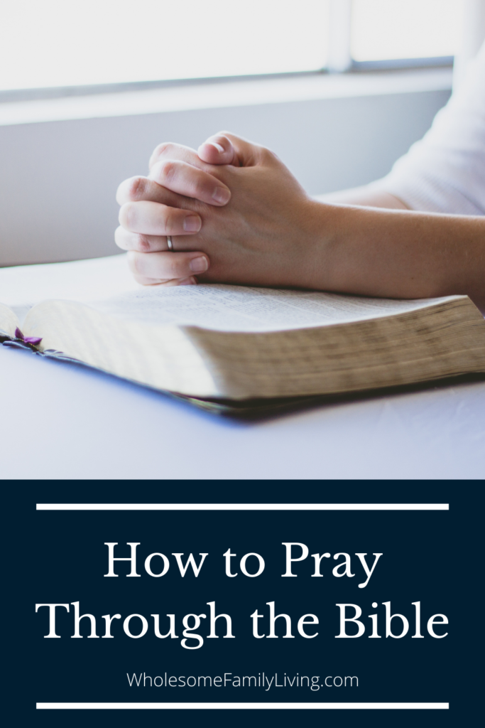 How to pray through the bible pin with hands praying on a bible