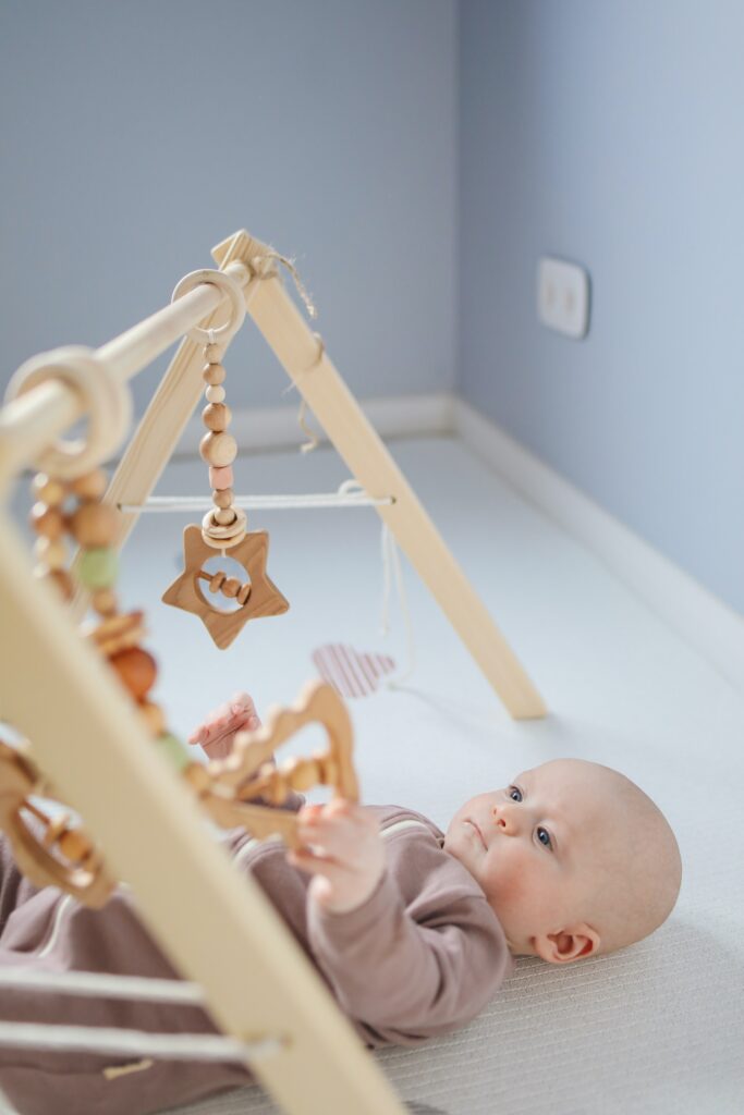 baby playing on floor