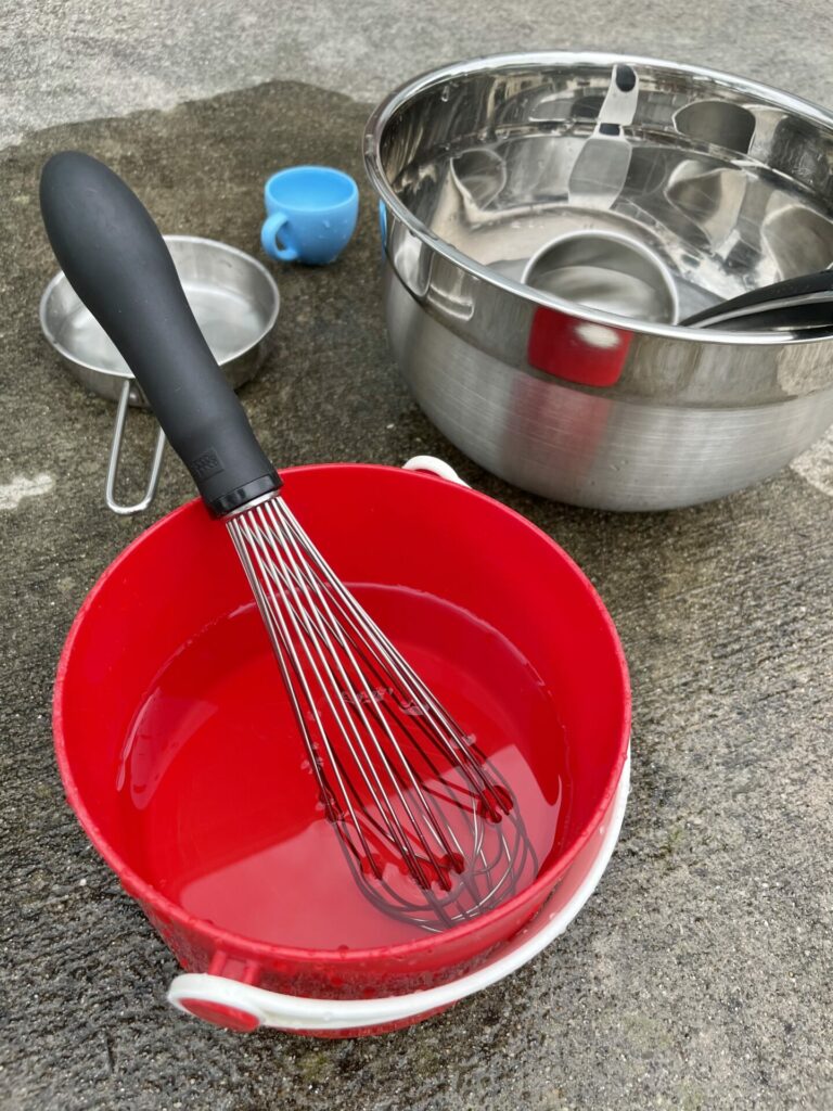 baking supplies filled with water for easy backyard summer activities