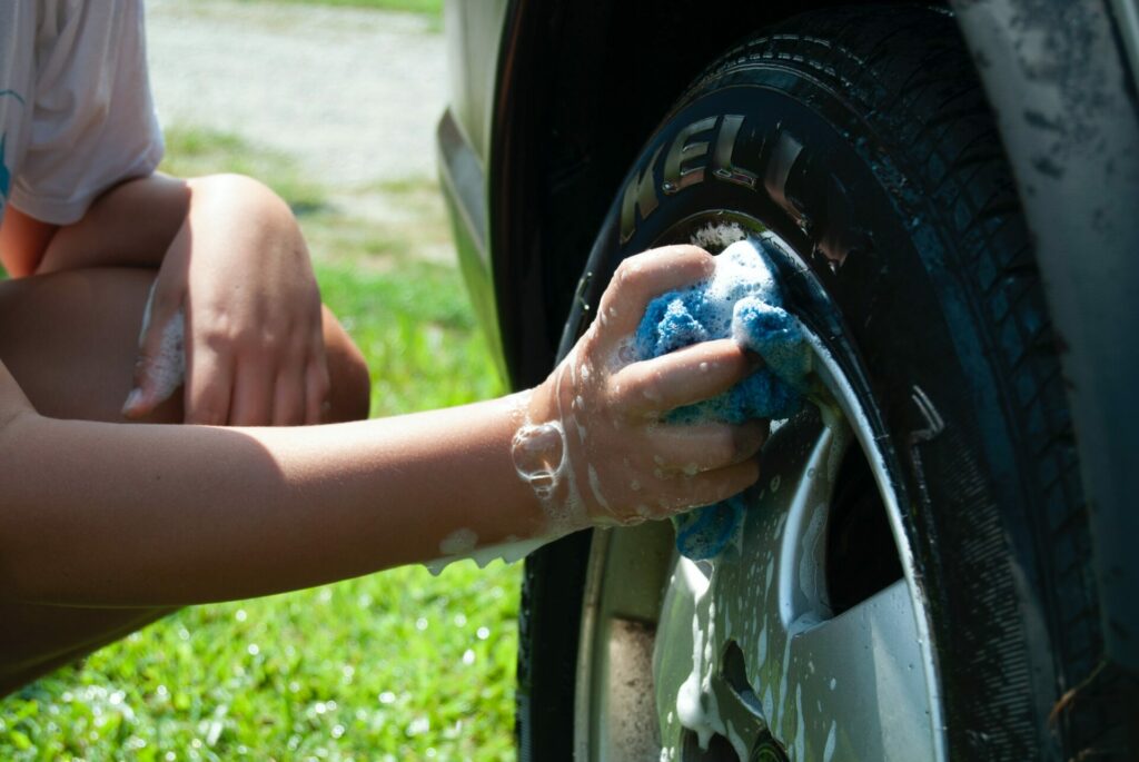 hand washing car tire