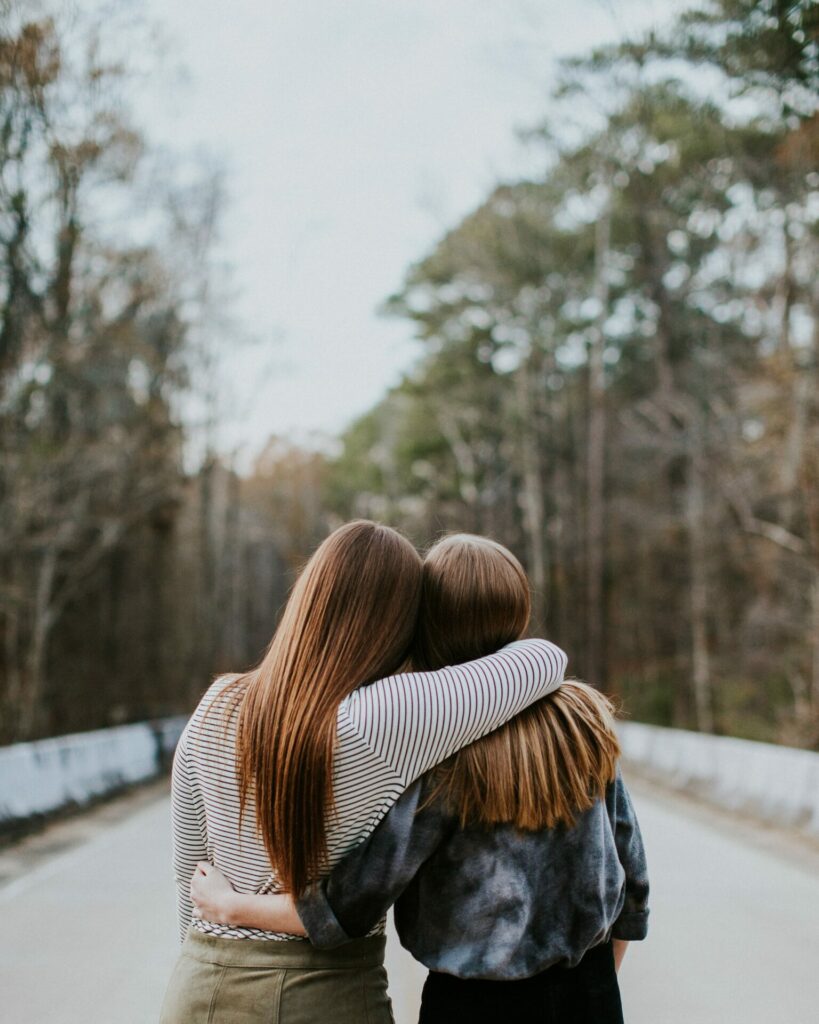 two women sharing a hug