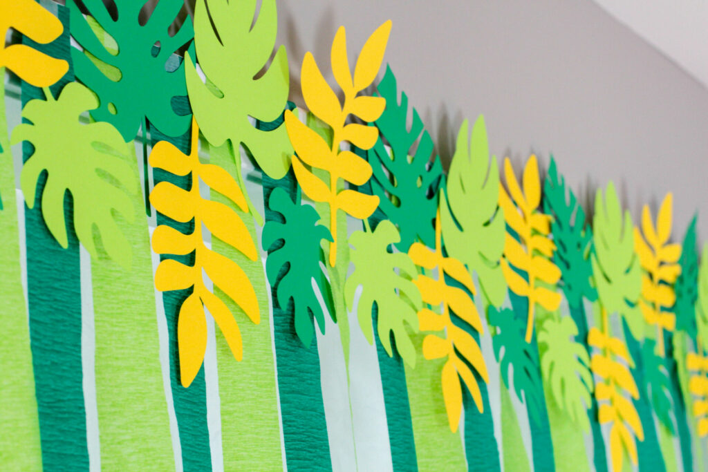 close up photo of the leaves at the top of the doorway display