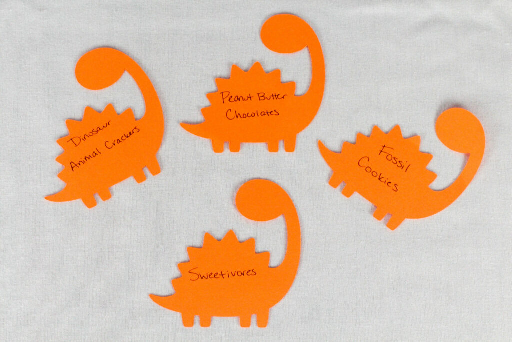 sweetivore food tags made from paper dinosaurs for dinosaur birthday party