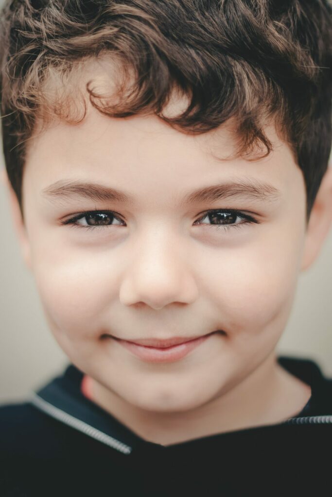 close up photo of boys face