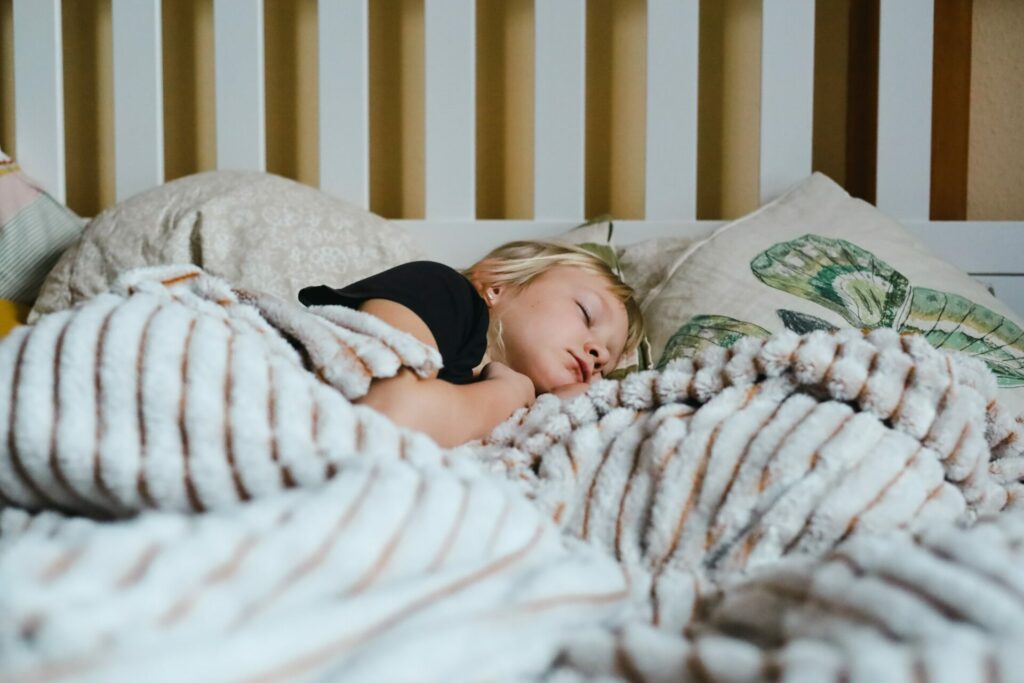 girl sleeping in bed